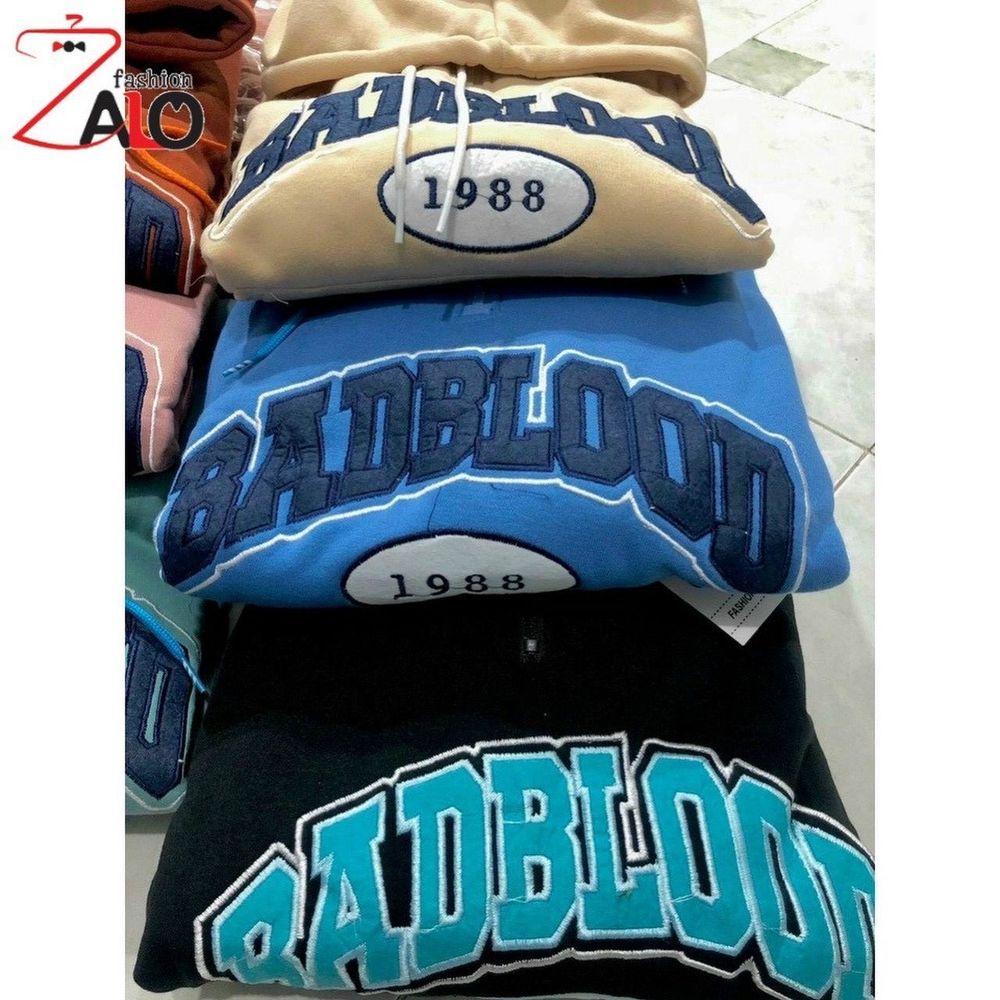 Áo khoác nỉ form 90kg dây kéo giữa cổ logo thêu, dây kéo phao