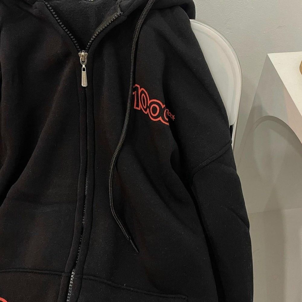 Áo khoác dây kéo in 10ook form rộng unisex .