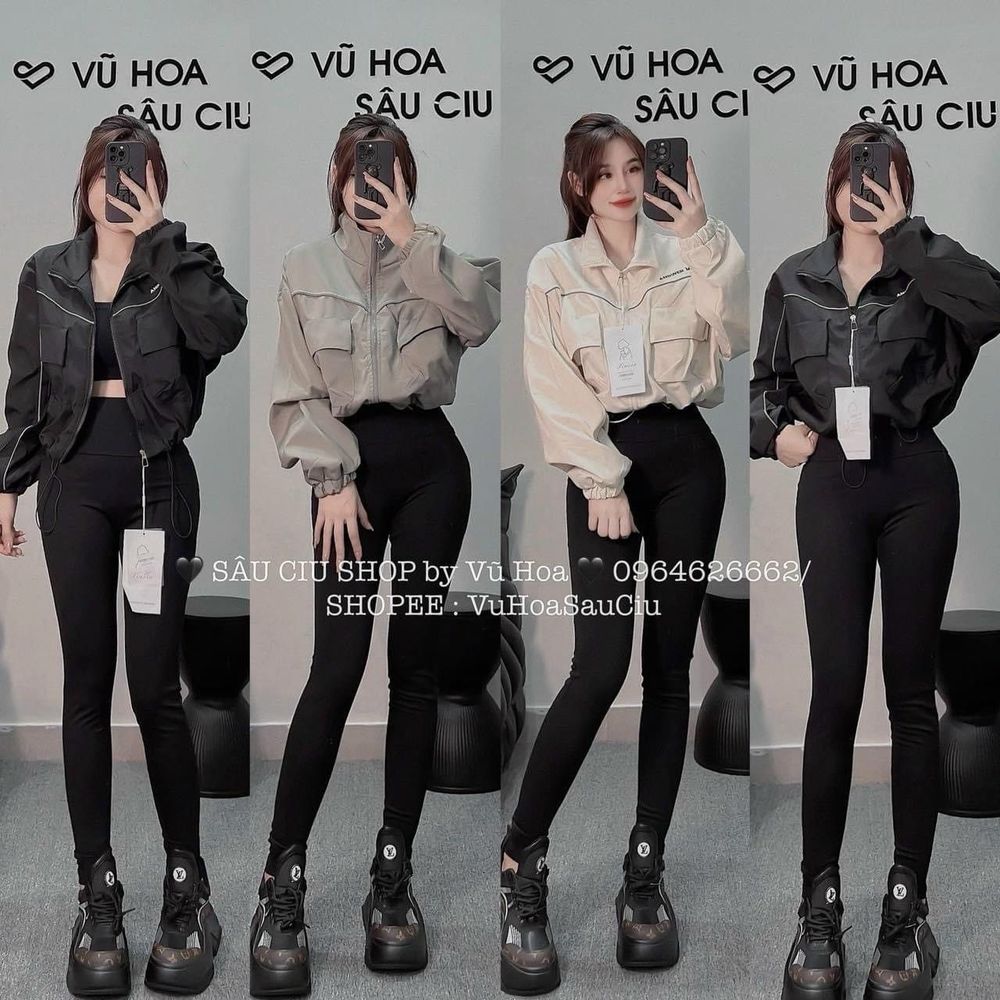 Áo khoác dù dáng lửng chạy mí viền,logo thêu, dây kéo phao.2 túi hộp trước ngực