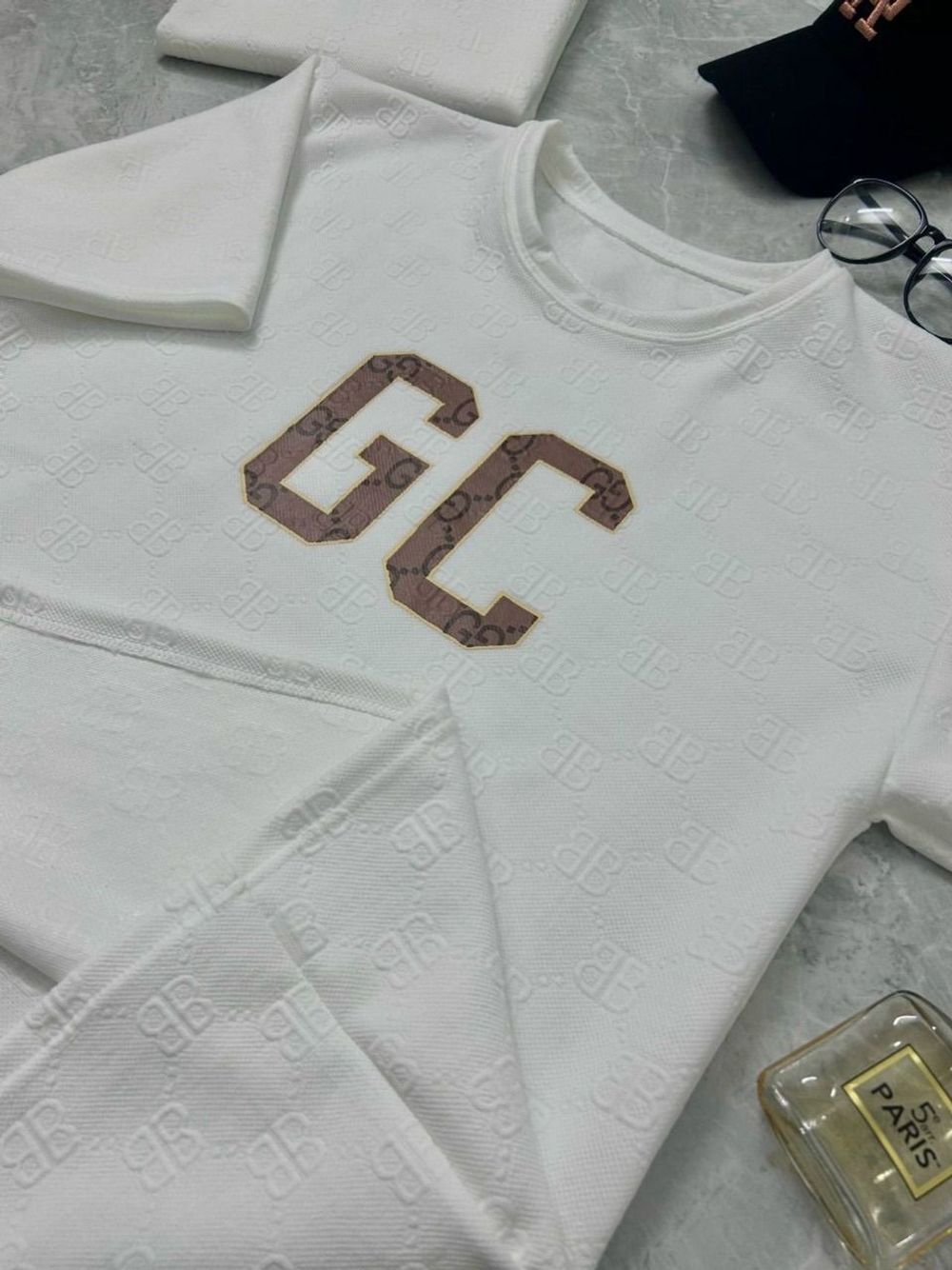 Áo thun nam logo in GC chất xốp in nổi