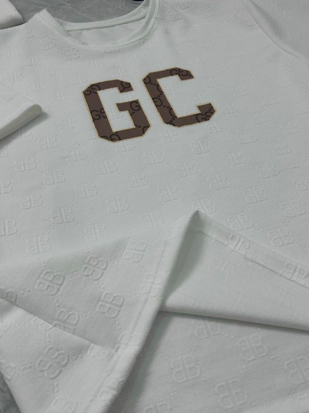 Áo thun nam logo in GC chất xốp in nổi