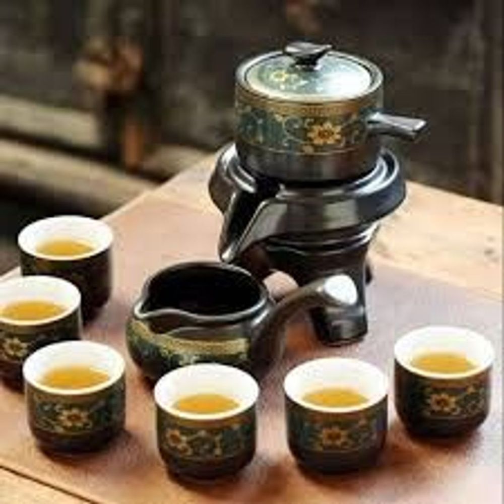 Bộ Ấm Chén Uống Trà Gốm Sứ Hoa Cẩm Đỏ - Sự Hòa Quyện Hoàn Hảo Giữa Nghệ Thuật Và Trà