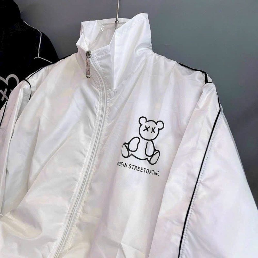 Áo khoác chất dù 2 lớp , dù phối in gấu .