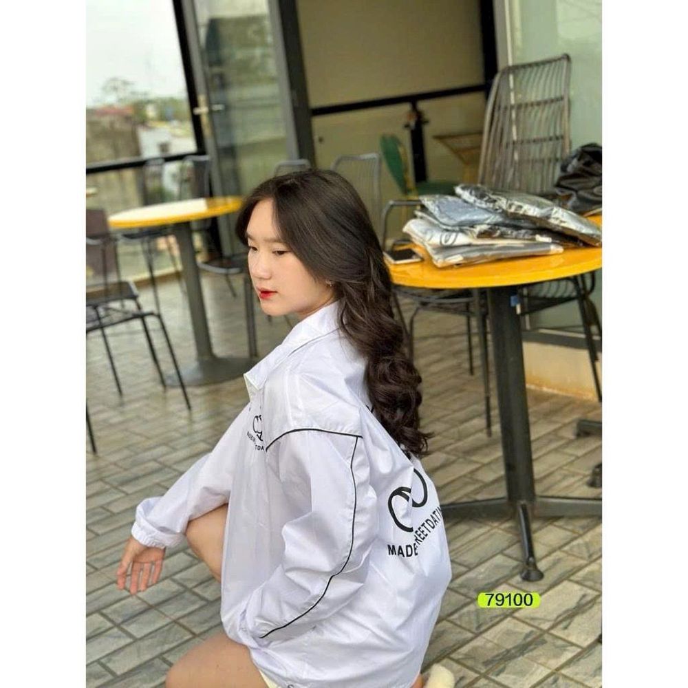 Áo khoác chất dù 2 lớp , dù phối in gấu .