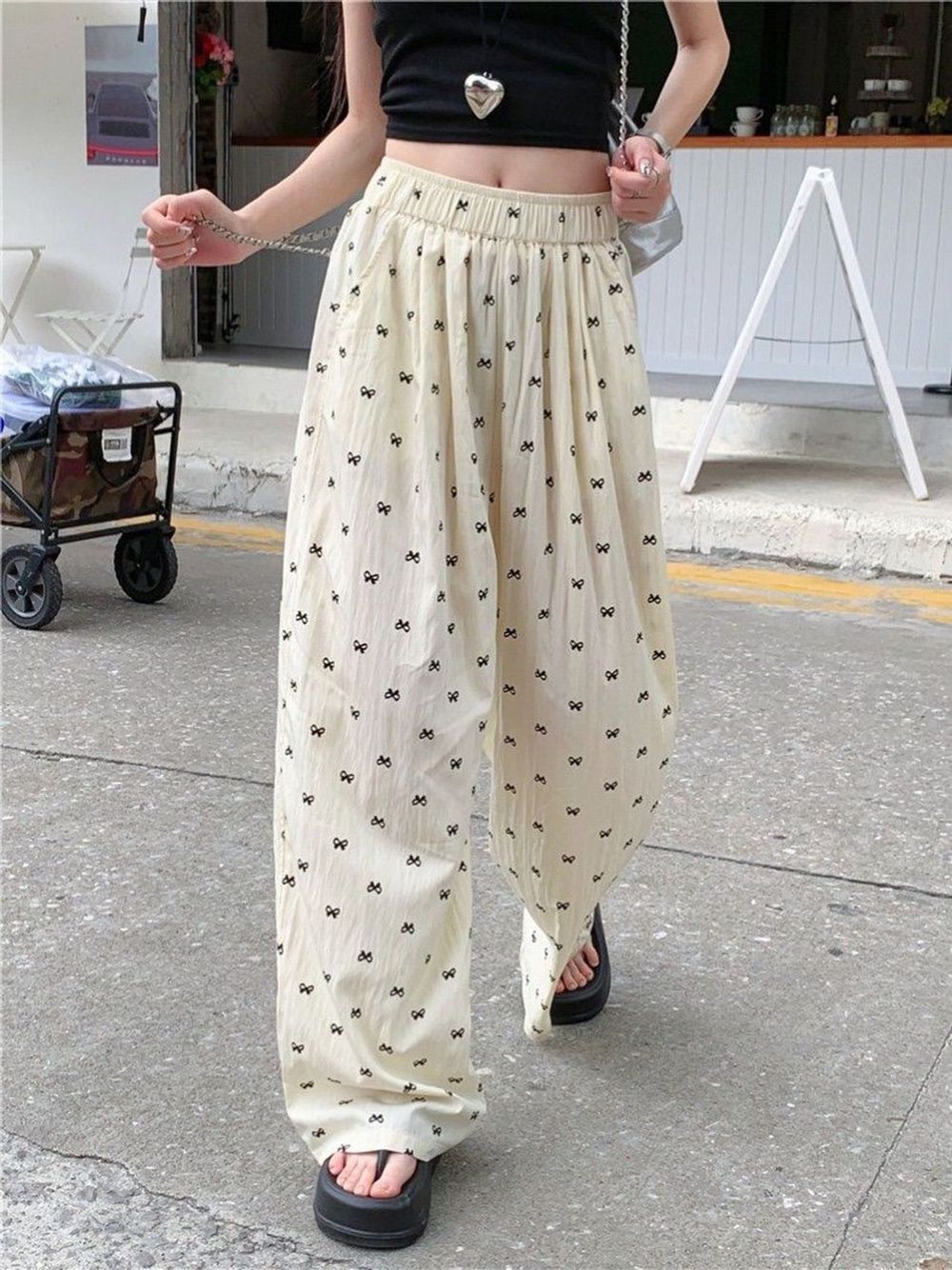 QUẦN DÀI LƯNG CHUN IN NƠ chất đũi gió nhăn Freesize dưới 55kg