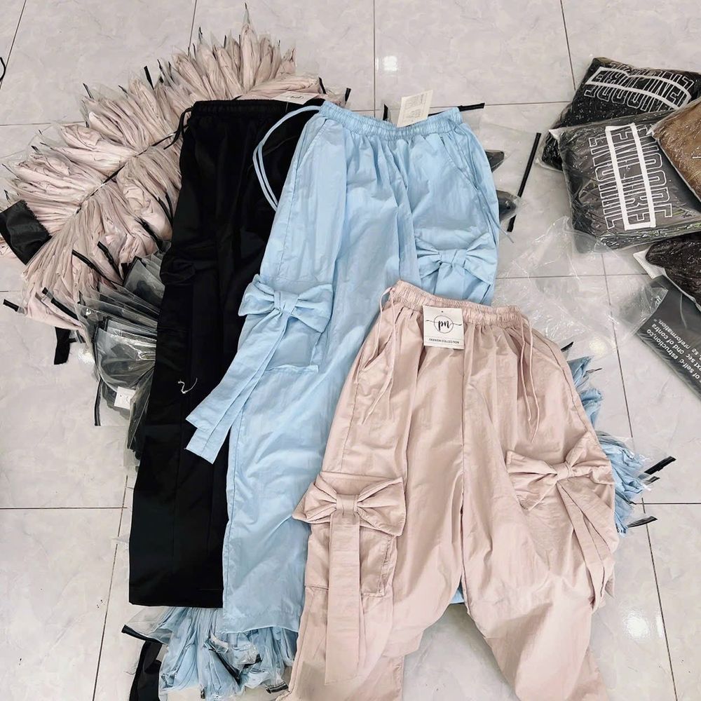 Quần ống rộng THẮT NƠ 2 túi, freesize dưới 70kg chất dù gió trượt nước thoáng mát