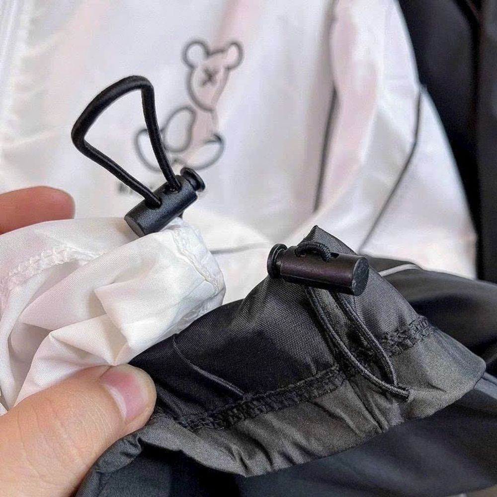 Áo khoác dù cổ bẻ in gấu phối viền tay