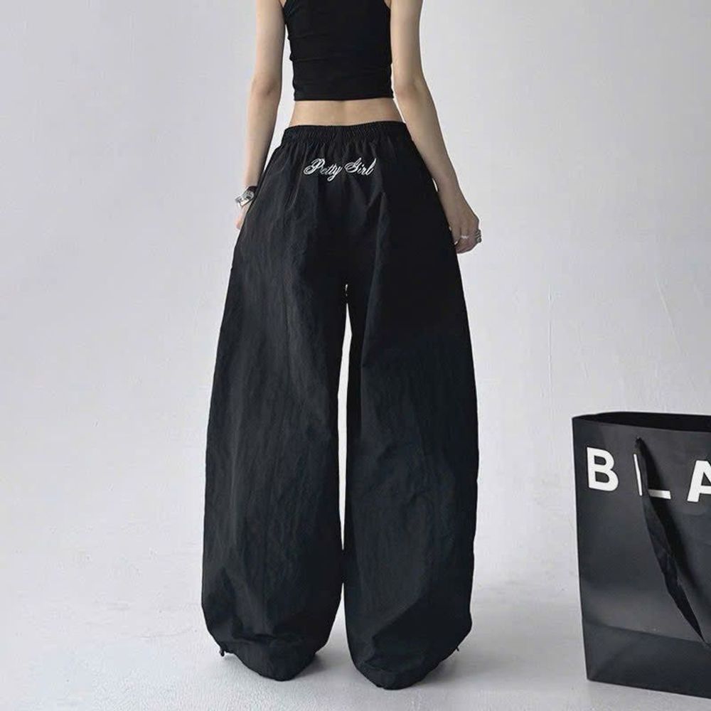Quần Ống Rộng Trơn Thêu Chữ Phía Sau Chất Dù Nhăn Mịn Mát Freesize Dưới 63kg