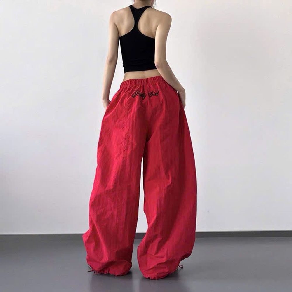 Quần Ống Rộng Trơn Thêu Chữ Phía Sau Chất Dù Nhăn Mịn Mát Freesize Dưới 63kg