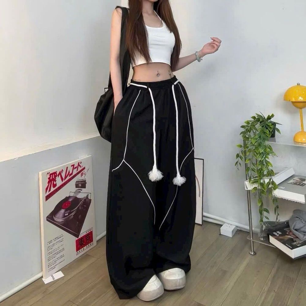 Quần dài nữ lai rộng thùng thình chất dù có dây luồng lưng, phối mí thân quần