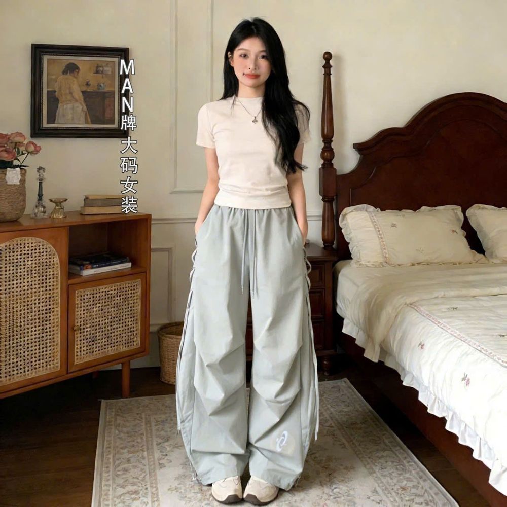 Quần nữ ống rộng thùng thìng có khoen, vải dù thời trang