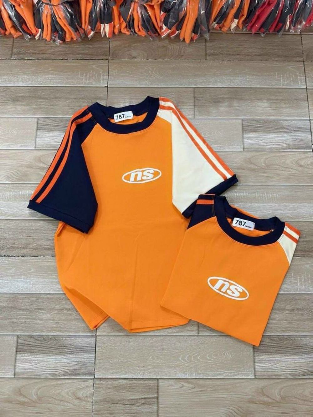 Áo baby tee chất thun cotton tay raplag phối màu cam xanh trắng hot trend