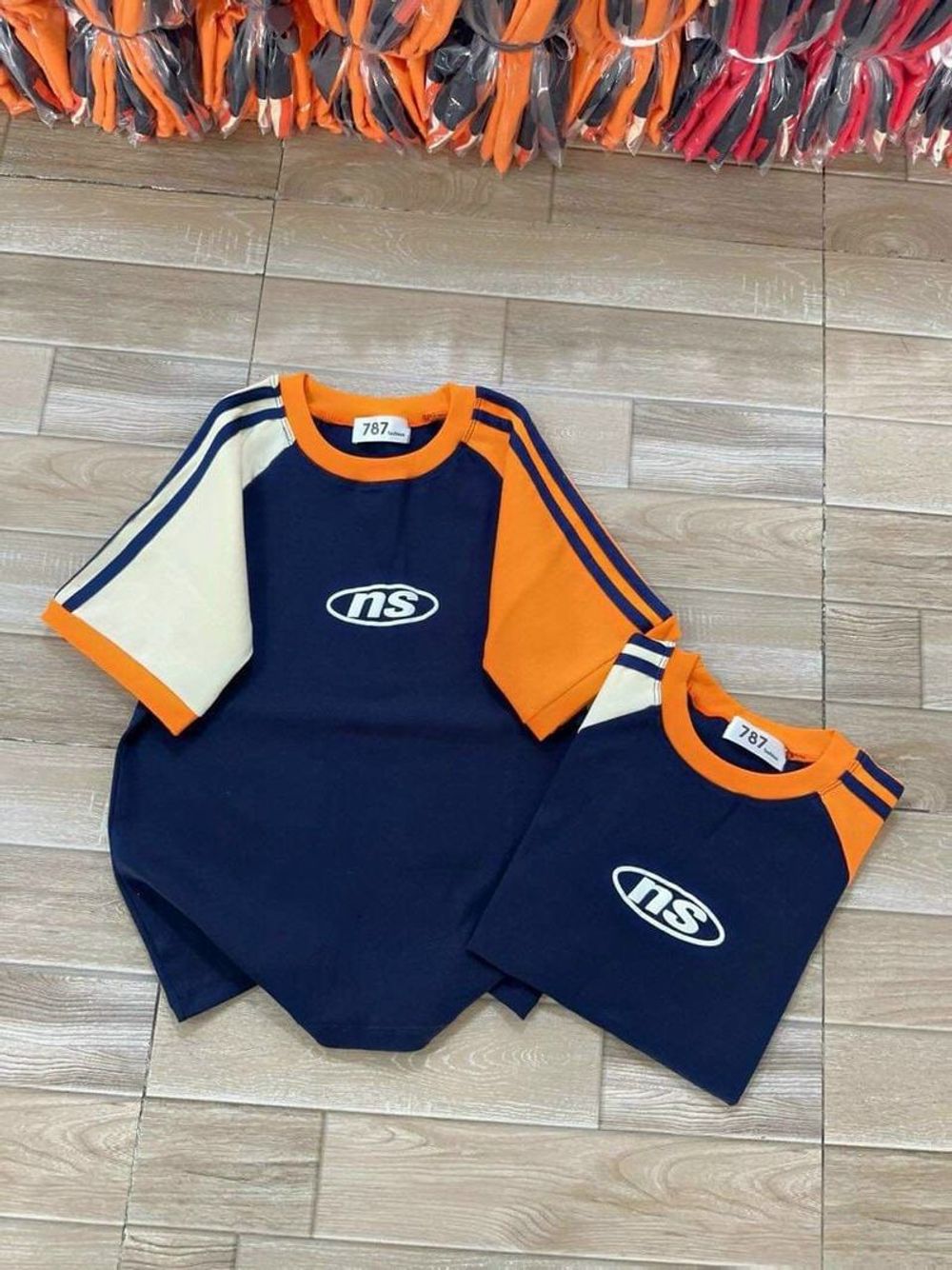 Áo baby tee chất thun cotton tay raplag phối màu cam xanh trắng hot trend