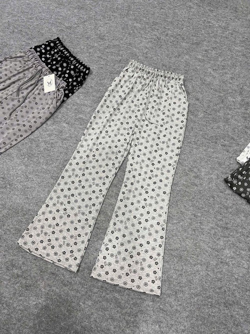 (Chất vải đẹp) Quần ống loe chất lem tâm mềm min logo in hoạ tiết form dưới 65kg .