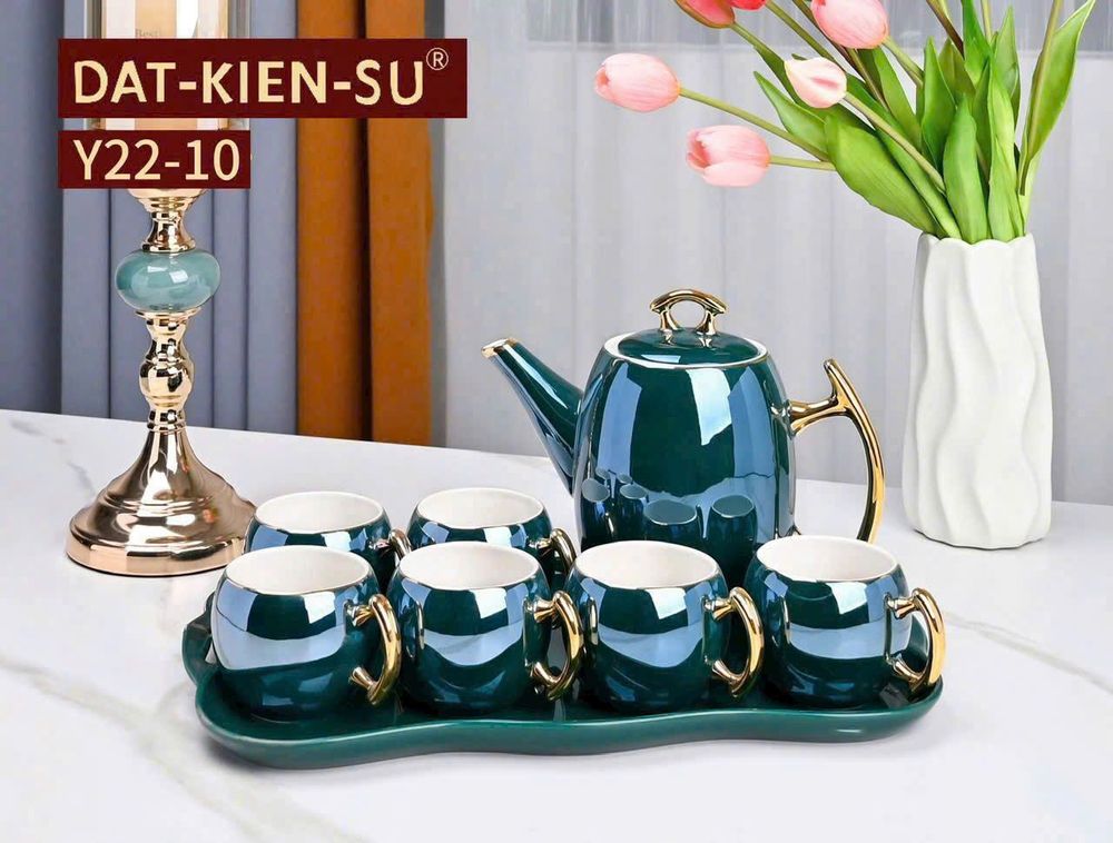 Bộ ấm chén sứ trắng xanh cổ vịt