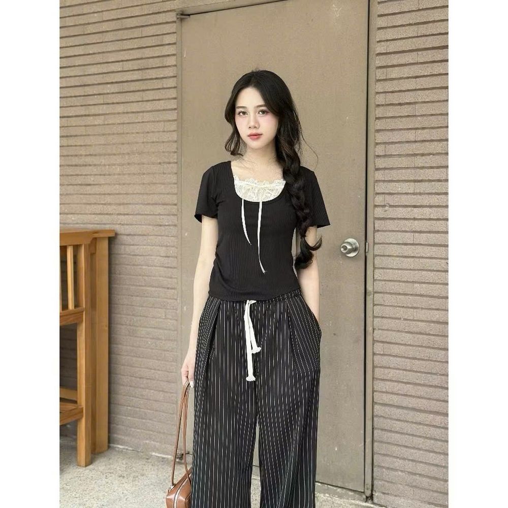 Quần ống rộng có lưng thun dây luồng mặc thoải mái cho cả nam và nữ