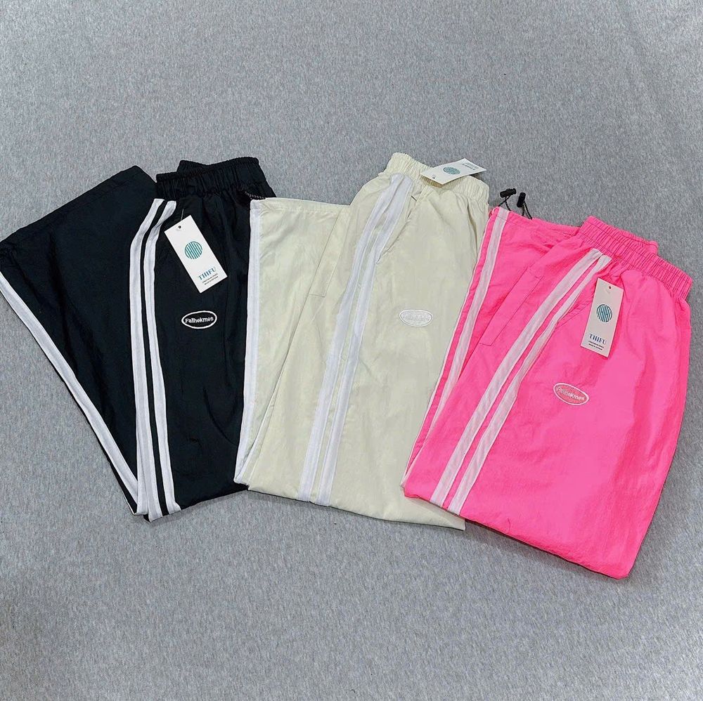 Quần Ống Rộng Dây Rút Lai Chất Dù Nhăn Phối 2 Sọc Logo Thêu Fallhekmes freesize dưới 65kg