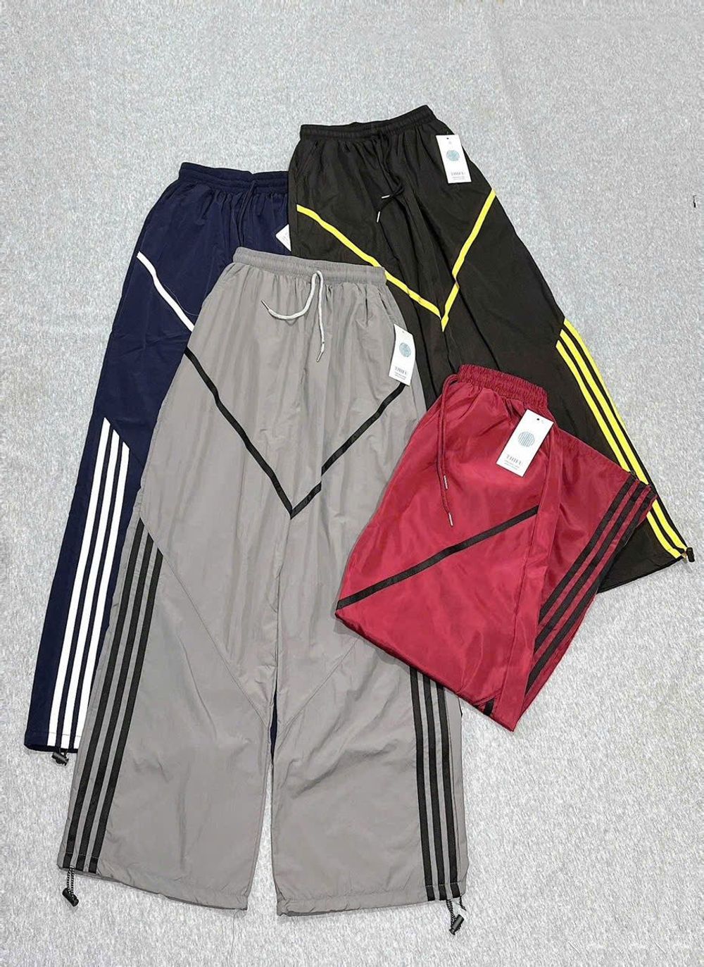 Quần Ống Rộng Dây Rút Chất Dù Nhăn Phối Viền V Và Sọc Freesize Dưới 65kg