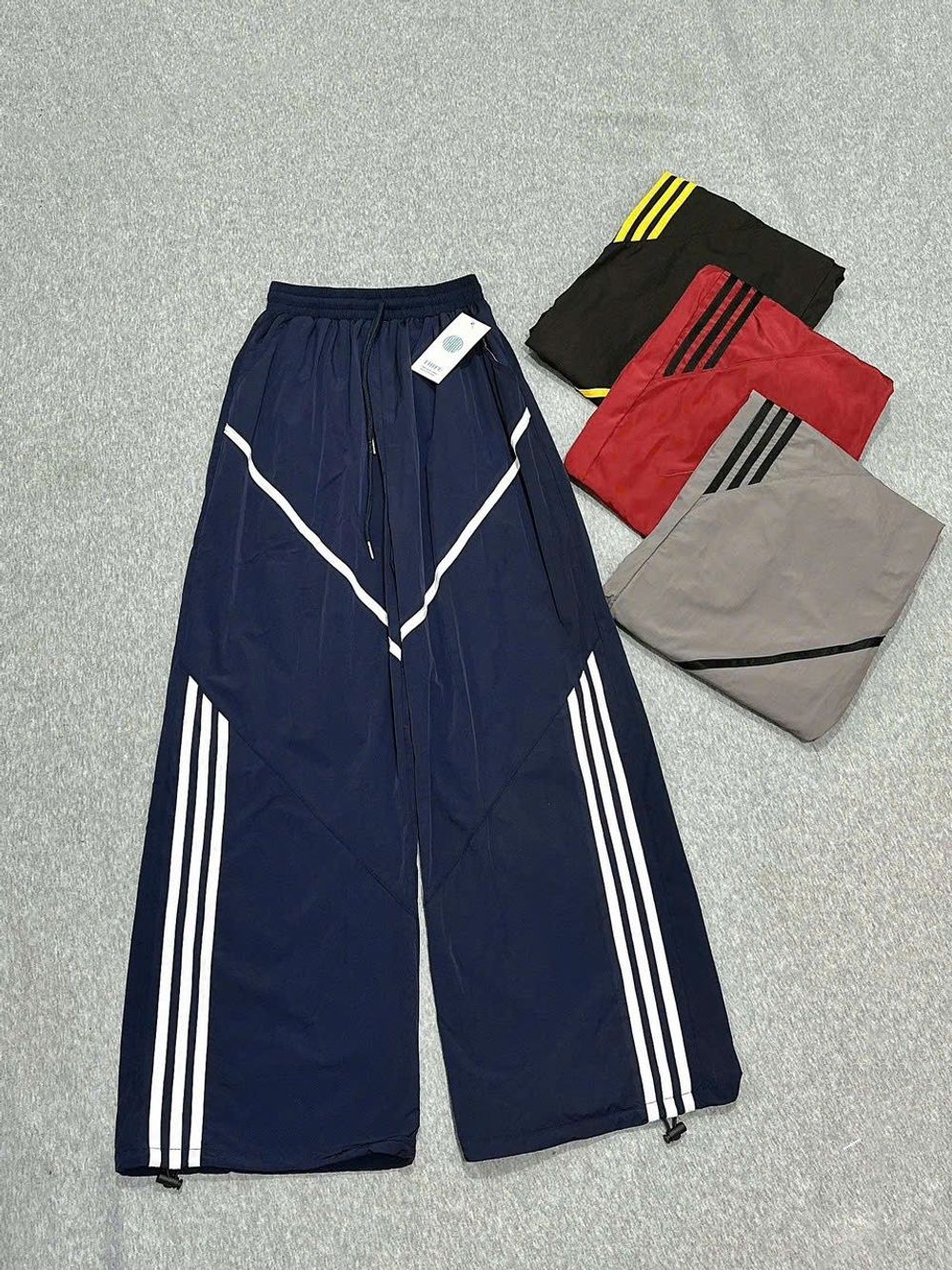 Quần Ống Rộng Dây Rút Chất Dù Nhăn Phối Viền V Và Sọc Freesize Dưới 65kg