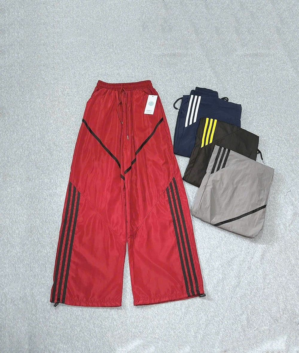 Quần Ống Rộng Dây Rút Chất Dù Nhăn Phối Viền V Và Sọc Freesize Dưới 65kg