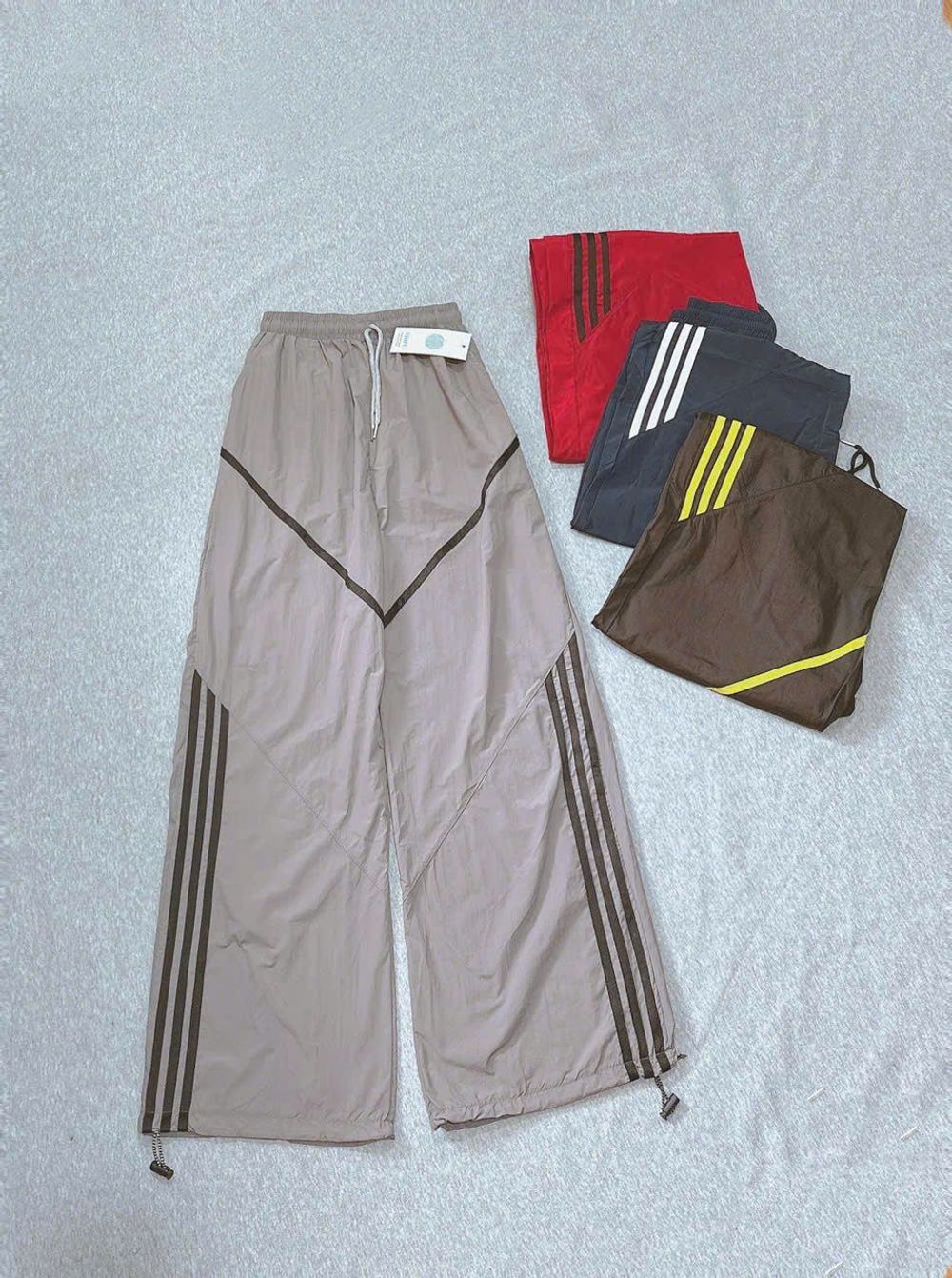 Quần Ống Rộng Dây Rút Chất Dù Nhăn Phối Viền V Và Sọc Freesize Dưới 65kg