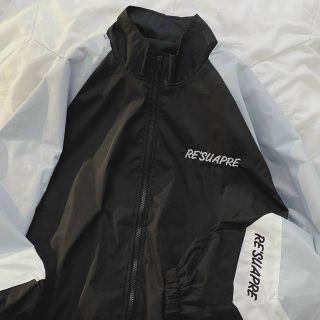 Áo khoác dù cổ bẻ phối màu logo thêu Áo khoác dù cổ bẻ phối màu logo thêu