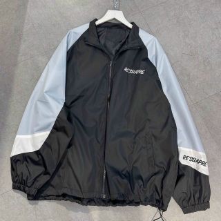 Áo khoác dù cổ bẻ phối màu logo thêu Áo khoác dù cổ bẻ phối màu logo thêu