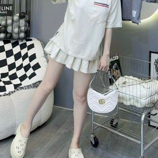 Set áo tay lỡ phối túi sọc + chân váy xếp ly chất thun conton, thấm hút mồ hôi tốt. Freesize dưới 63kg