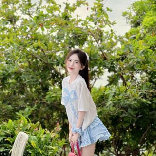 Set áo tay lỡ đính nơ bèo, chân váy sọc xanh trắng