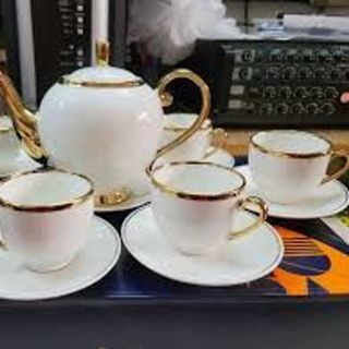 Bộ ấm trà sứ trắng viền vàng phong cách Châu âu cao cấp.
