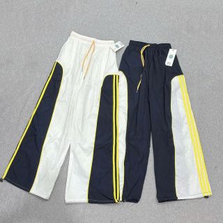 Quần Ống Rộng Dây Rút Chất Dù Nhăn Phối Màu Và Sọc Freesize Dưới 65kg Quần Ống Rộng Dây Rút Chất Dù Nhăn Phối Màu Và Sọc Freesize Dưới 65kg