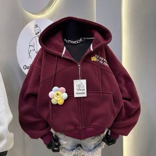 Áo khoác nỉ nữ mũ rộng kèm charm mặt cười độc đáo Áo khoác nỉ nữ mũ rộng kèm charm mặt cười độc đáo