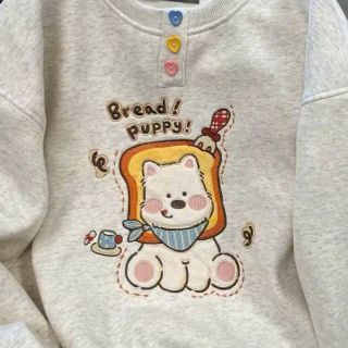 Áo dài tay nữ cổ tròn đính charm nút Áo dài tay nữ cổ tròn đính charm nút