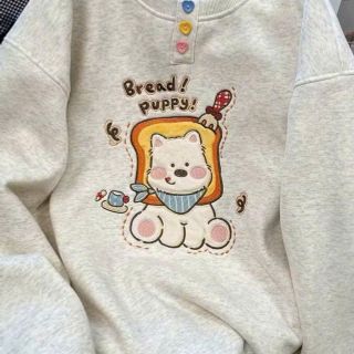 Áo dài tay nữ cổ tròn đính charm nút Áo dài tay nữ cổ tròn đính charm nút