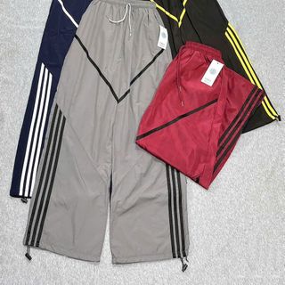 Quần Ống Rộng Dây Rút Chất Dù Nhăn Phối Viền V Và Sọc Freesize Dưới 65kg