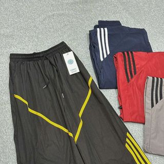 Quần Ống Rộng Dây Rút Chất Dù Nhăn Phối Viền V Và Sọc Freesize Dưới 65kg