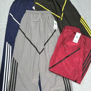 Quần Ống Rộng Dây Rút Chất Dù Nhăn Phối Viền V Và Sọc Freesize Dưới 65kg