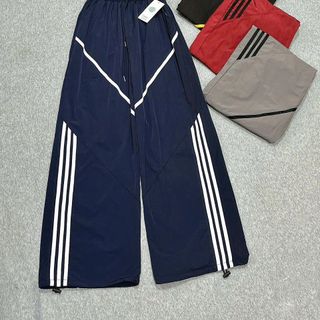 Quần Ống Rộng Dây Rút Chất Dù Nhăn Phối Viền V Và Sọc Freesize Dưới 65kg