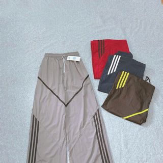 Quần Ống Rộng Dây Rút Chất Dù Nhăn Phối Viền V Và Sọc Freesize Dưới 65kg